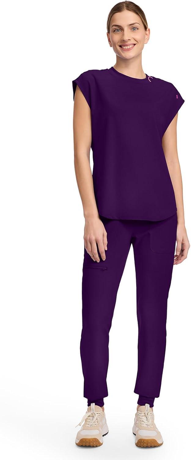 imageMed Couture Scrub Top Women Round Neck Tuckable with 2 Zipper Pockets with Rounded Hem MC703Eggplant