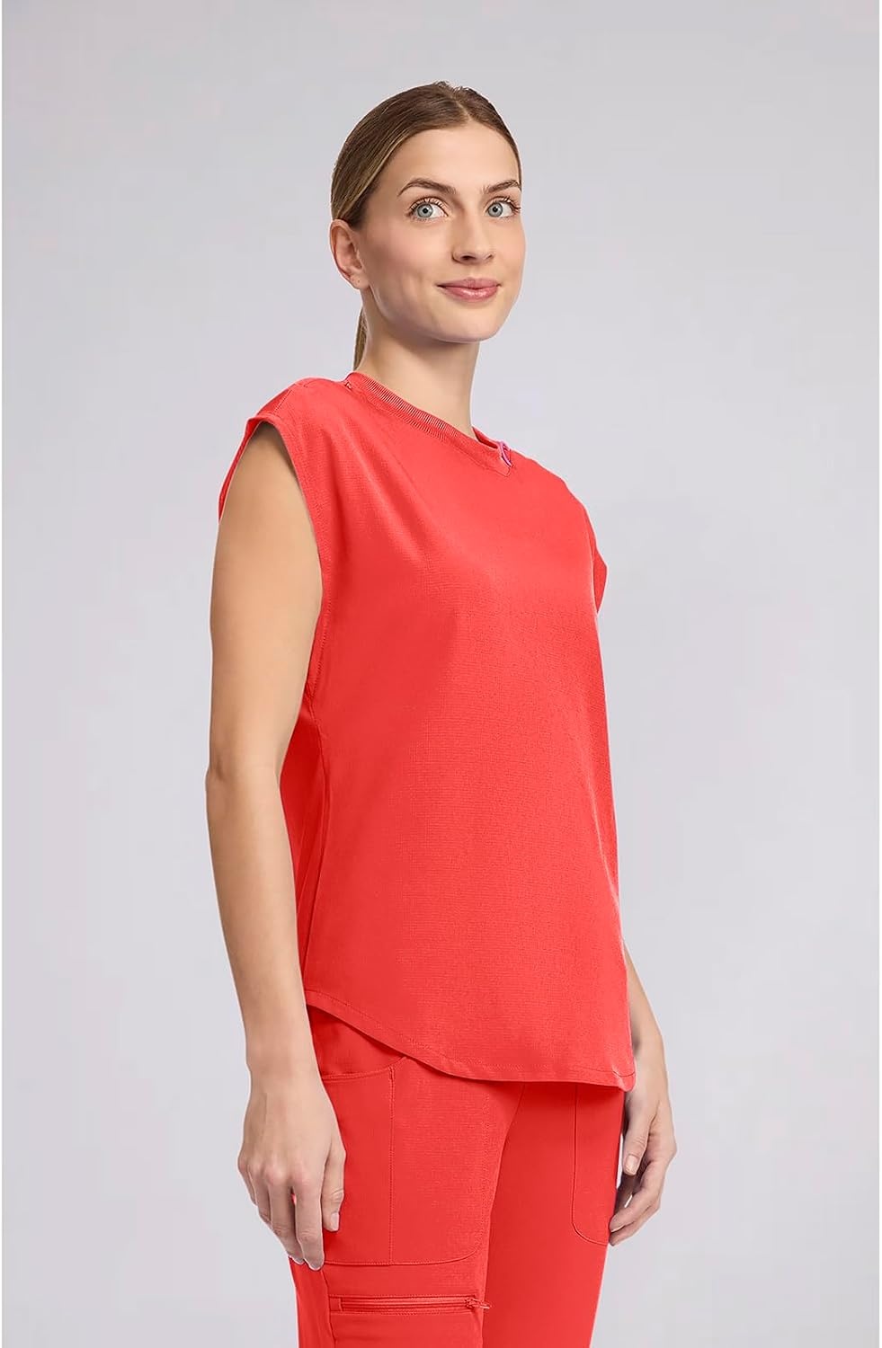 image:imageMed Couture AMP Womens Scrub Tops Round Neck Tuckable 2 Zipper PocketOne in a Melon